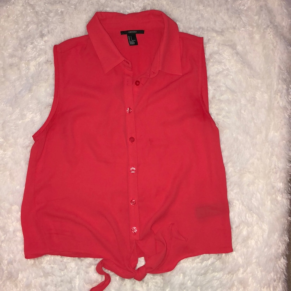 Red/Orange blouse with tying at the bottom.
